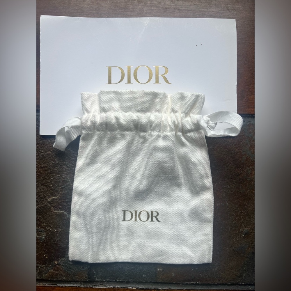 DIOR Gold Logo White Pouch. NEW